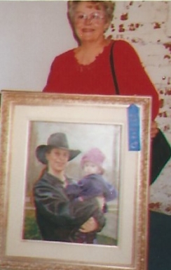 008 - shirley with painting of glenn and oria
